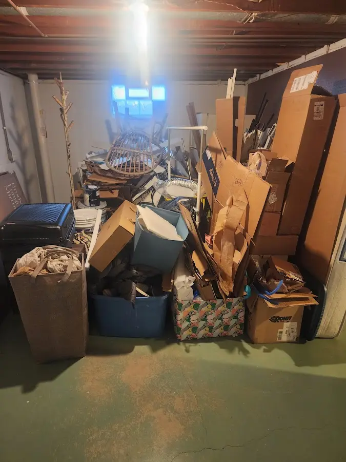 Roll-off dumpster container at job site for Concrete Dumpster Rental in Paxton